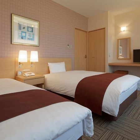 Kanazawa Tokyu Hotel Buitenkant foto A typical room at the hotel