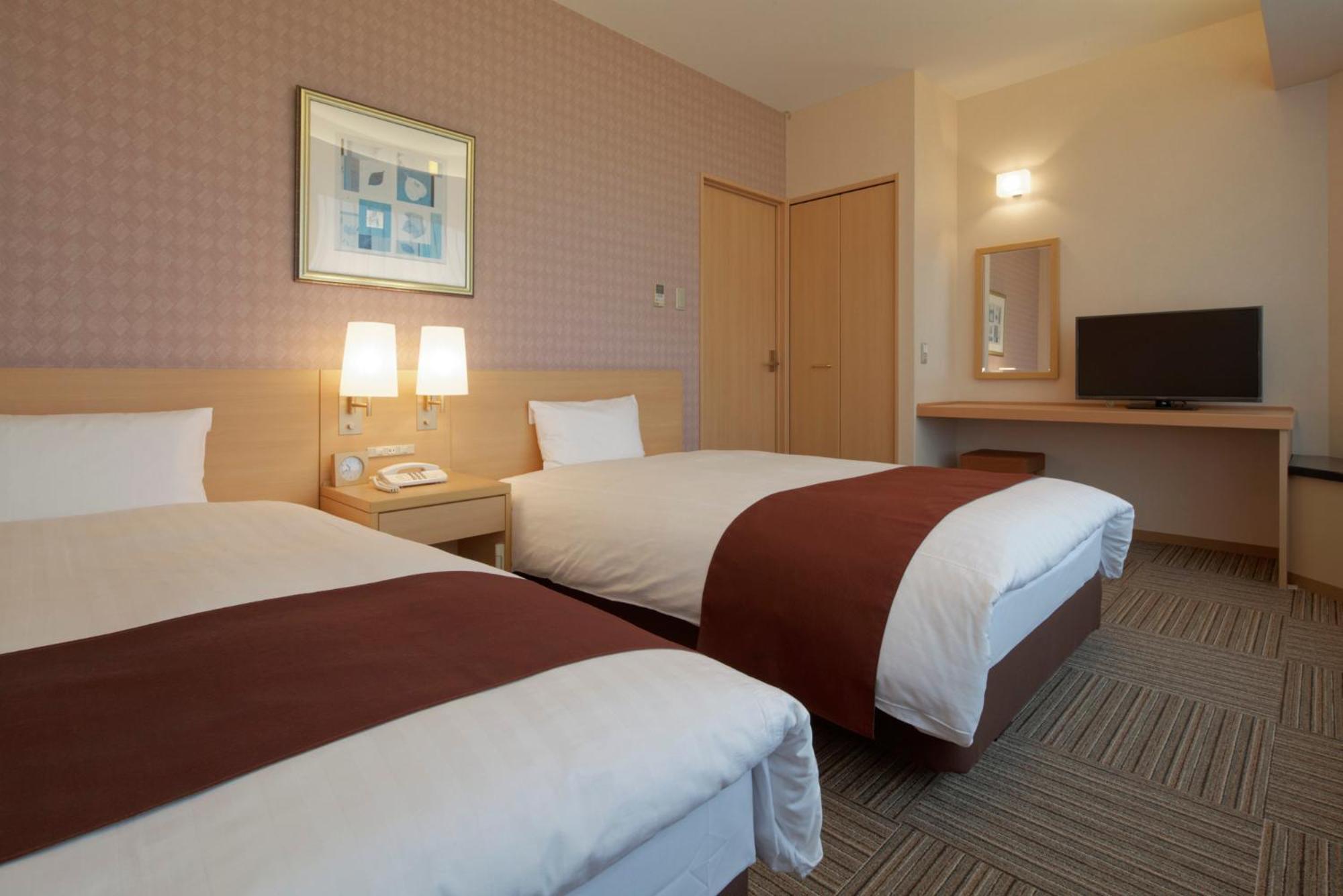 Kanazawa Tokyu Hotel Buitenkant foto A typical room at the hotel